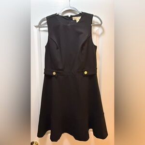 Michael Kors Black Dress Structured bodice, gold button accents, classic black